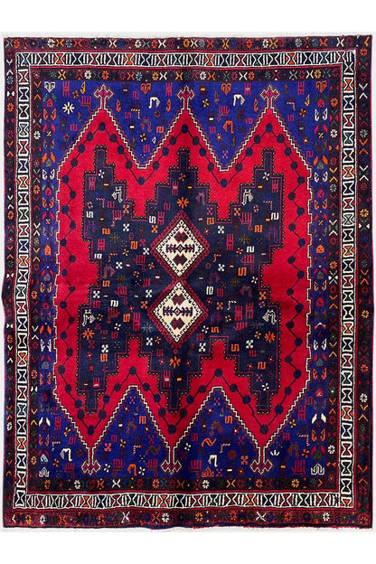 Rug front: dark blue with a red central motif and white decorative border