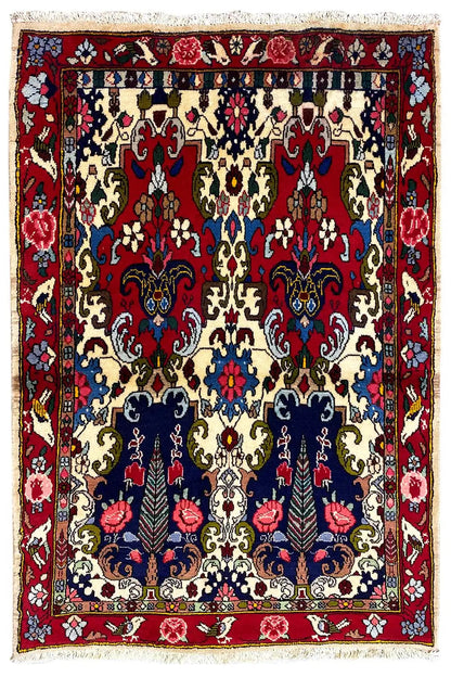 Bakhtiari rug, rectangular, red field with a classic border and ornamental pattern
