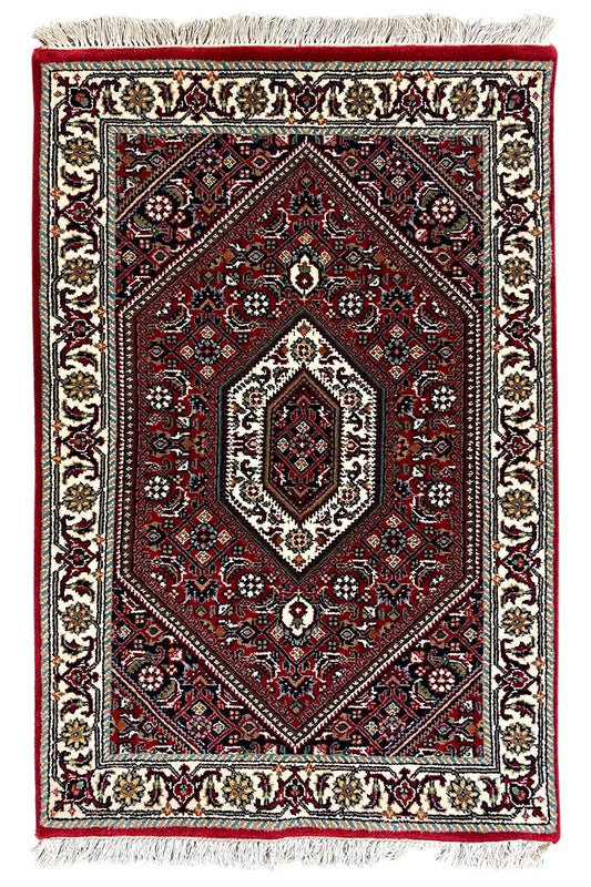 Bidjar rug 93x62 cm, rectangular, red medallion, cream-colored border, fringes