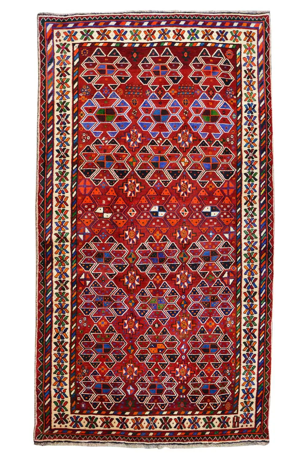 Shiraz rug, front view: red field with an ornamental central pattern and border