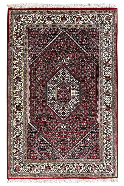 Bidjar rug (185x124 cm) - rectangular rug with a red field, border ornaments, and central motif