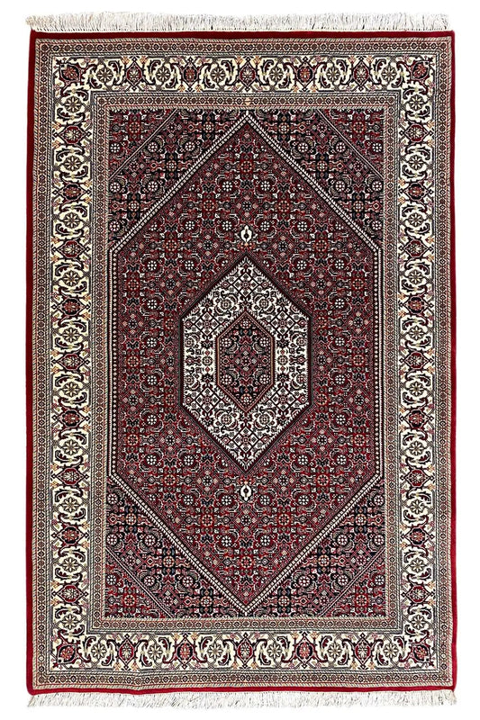 Bidjar rug (185x124 cm) - rectangular rug with a red field, border ornaments, and central motif