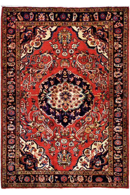Hamadan rug with red field, blue-red border, and central medallion