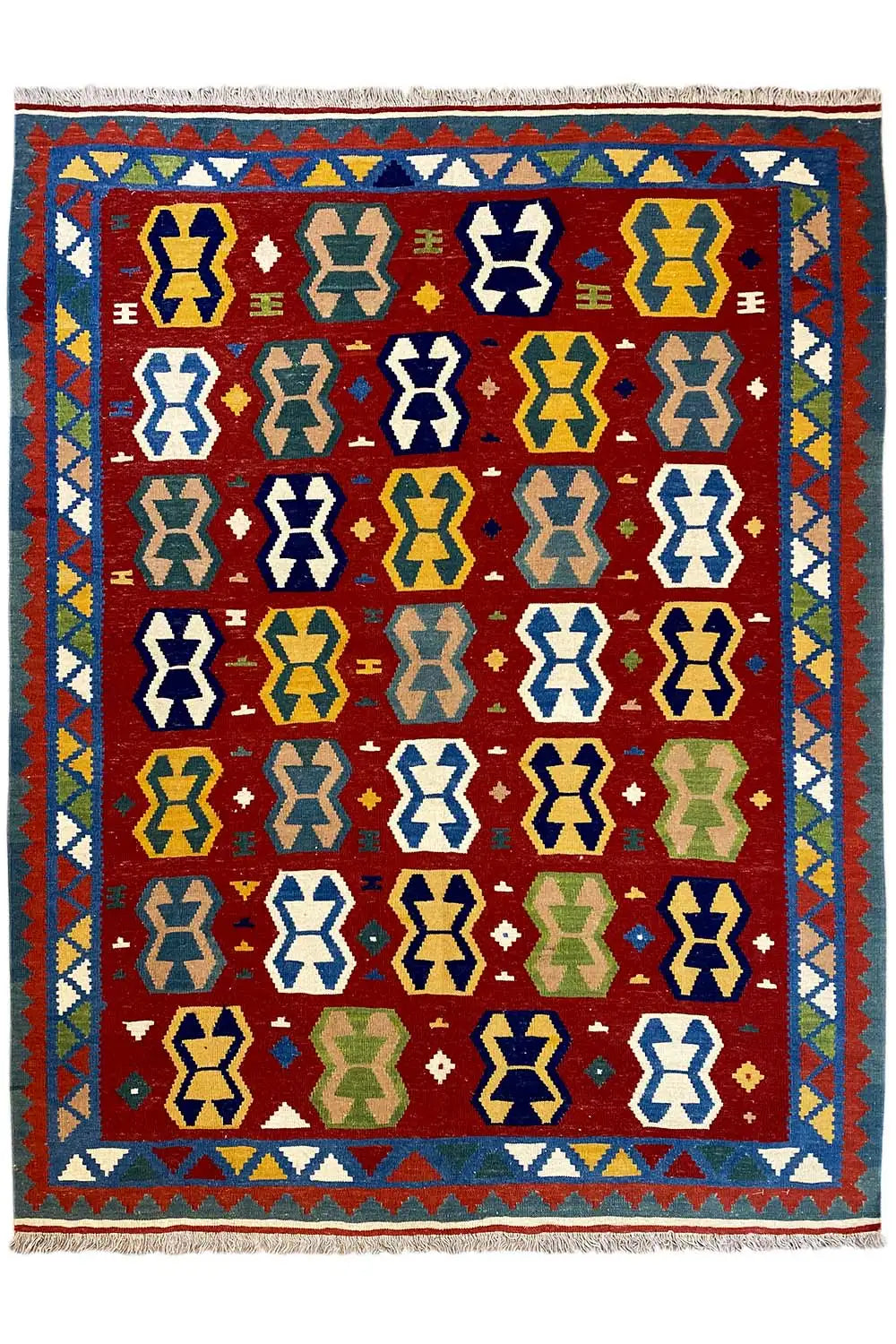 Kilim rug with a small-scale diamond pattern in red, blue, yellow, and green