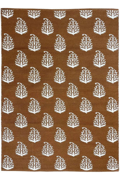 Brown kilim with white tree motifs, square rug shape