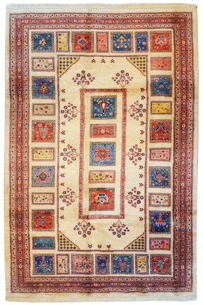 Oriental rug with a square medallion, red, blue and cream-colored ornaments