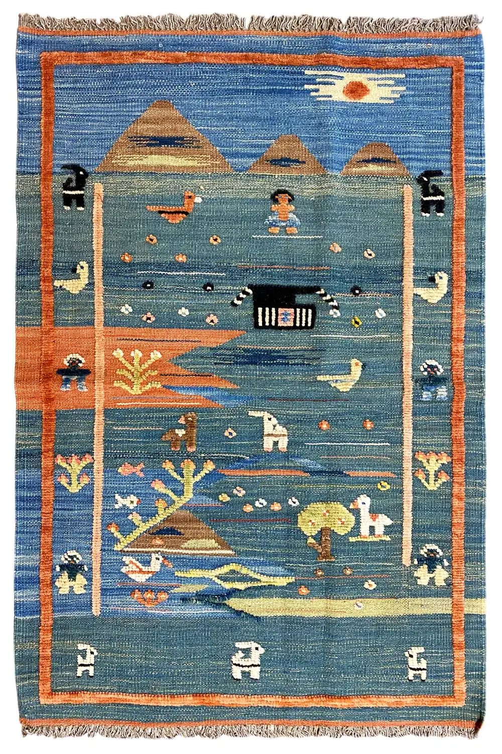 Blue kilim rug with orange border, central landscape motif, and fringes