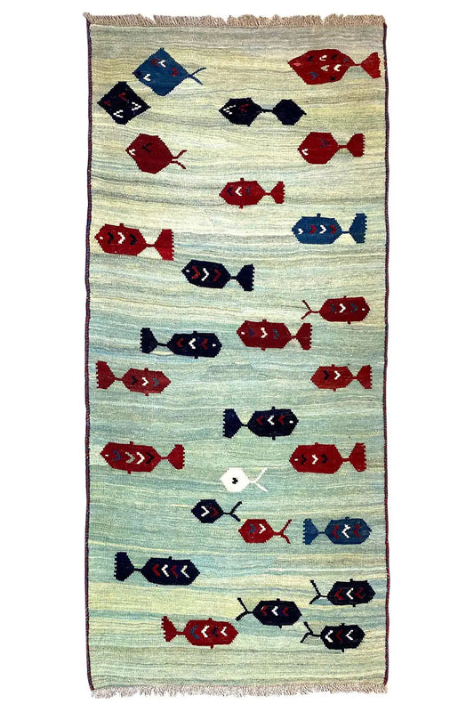 Kilim runner with a fish pattern in red, blue, and dark blue, light beige base color