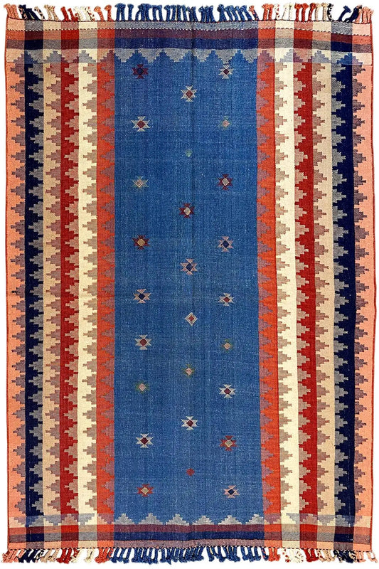 Rectangular rug with a blue central field, red-and-white stripes, and fringes, with a bound edge