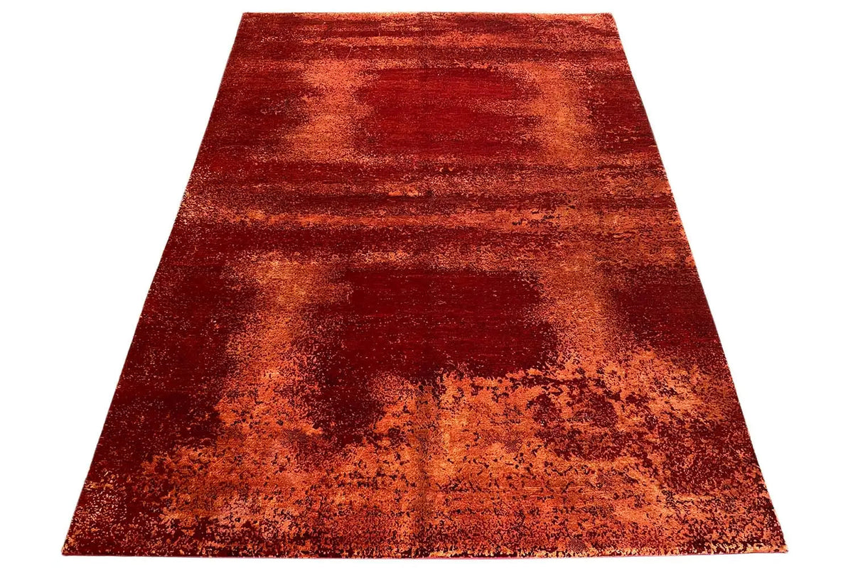 Rectangular red rug with striped gradient pattern
