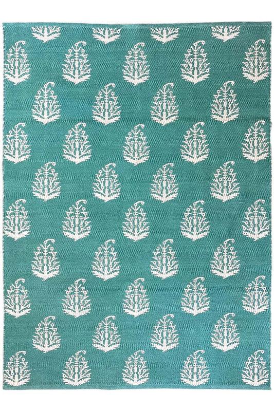 Modern flat-woven green kilim rug with a white tree pattern