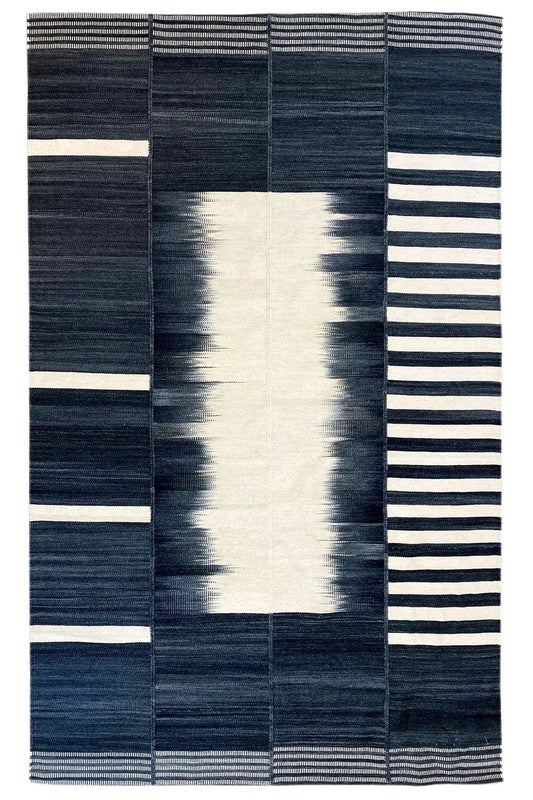 Modern kilim with diamond and stripe elements in dark blue and cream