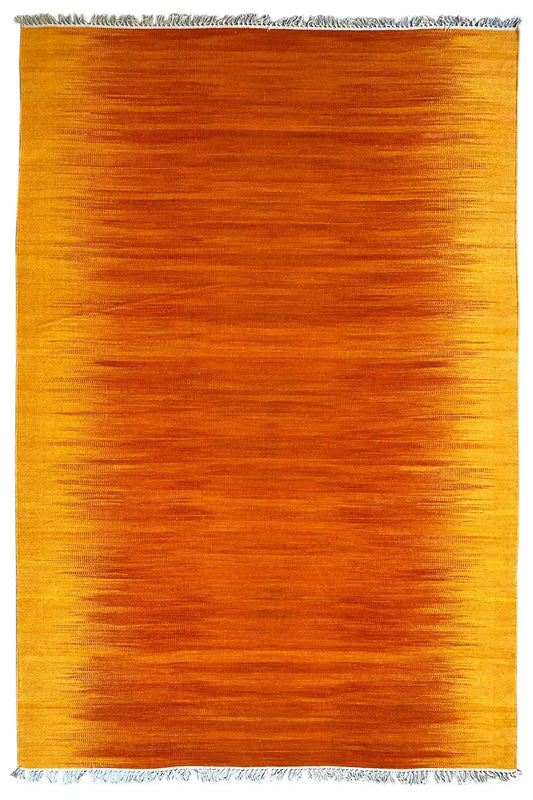Yellow-orange kilim rug with fringe along the edges, rectangular