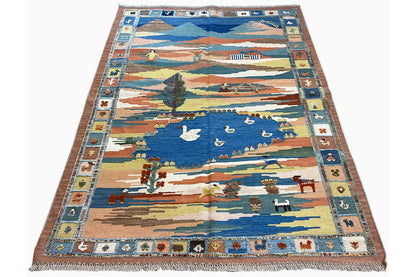 Full-size kilim rug with a landscape design, border ornaments, and fringes