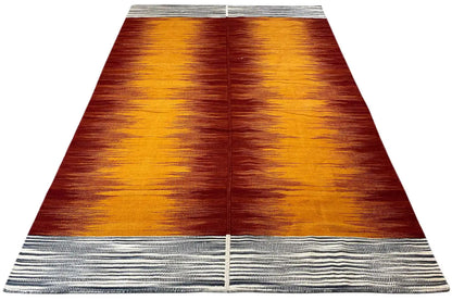 Kilim rug, rectangular with an orange-red pattern and gray striped border