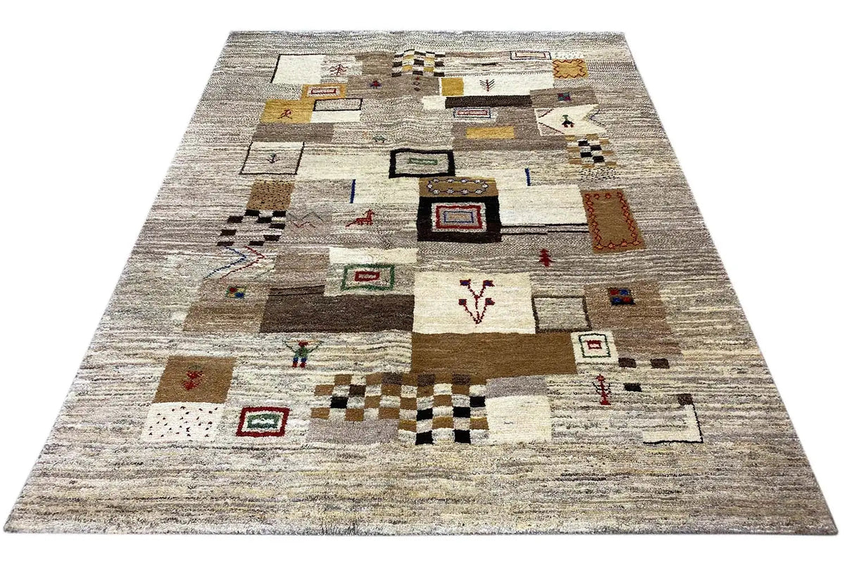 Gabbeh rug with a speckled pile and patchwork motifs in beige and brown