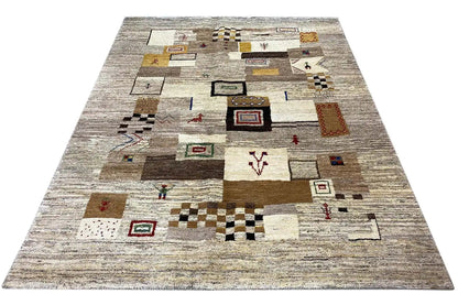 Gabbeh rug with a speckled pile and patchwork motifs in beige and brown