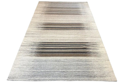 Dhurrie rug, triangular view: wide lines in gray and brown on light beige