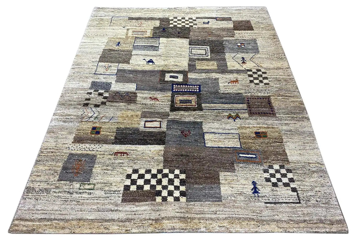 Rectangular rug with a beige background and dark gray blocks, many square patterns