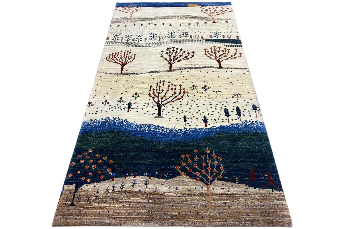 Gabbeh rug with tree motifs, a white-cream surface and a dark central stripe