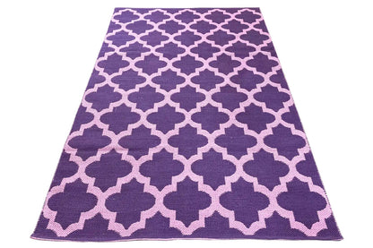 Kilim folded into a triangular shape, purple mosaic pattern with light interstitial shapes