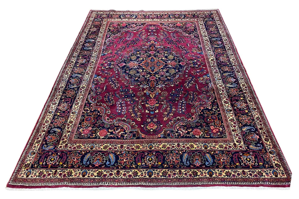 Rug with a rectangular pattern, red background, and blue borders