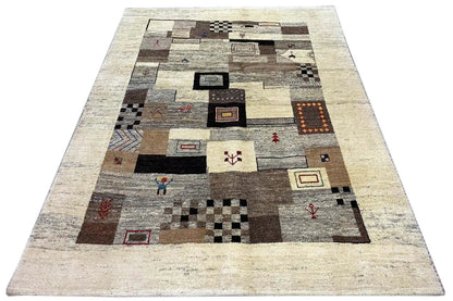 Rug with a beige border and an abstract patchwork pattern in gray, brown, and black