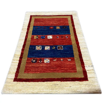 Gabbeh rug with red and blue medallion band and cream-colored border, 93x59 cm