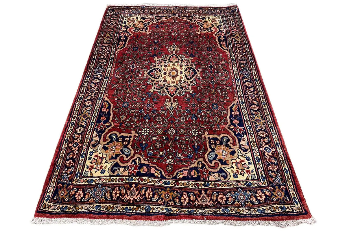 Rug with borders and medallions, dark red with blue accents, flat-weave