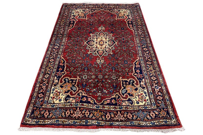 Rug with borders and medallions, dark red with blue accents, flat-weave