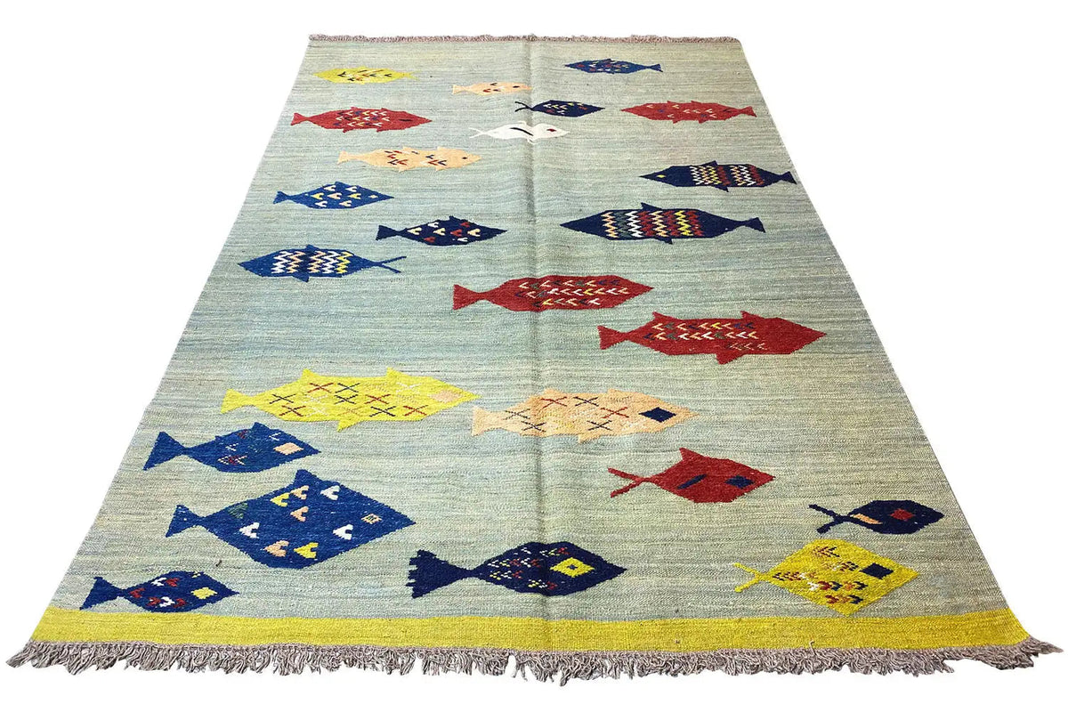 Kilim, multicolored with fish motifs; rectangular, fringes all around