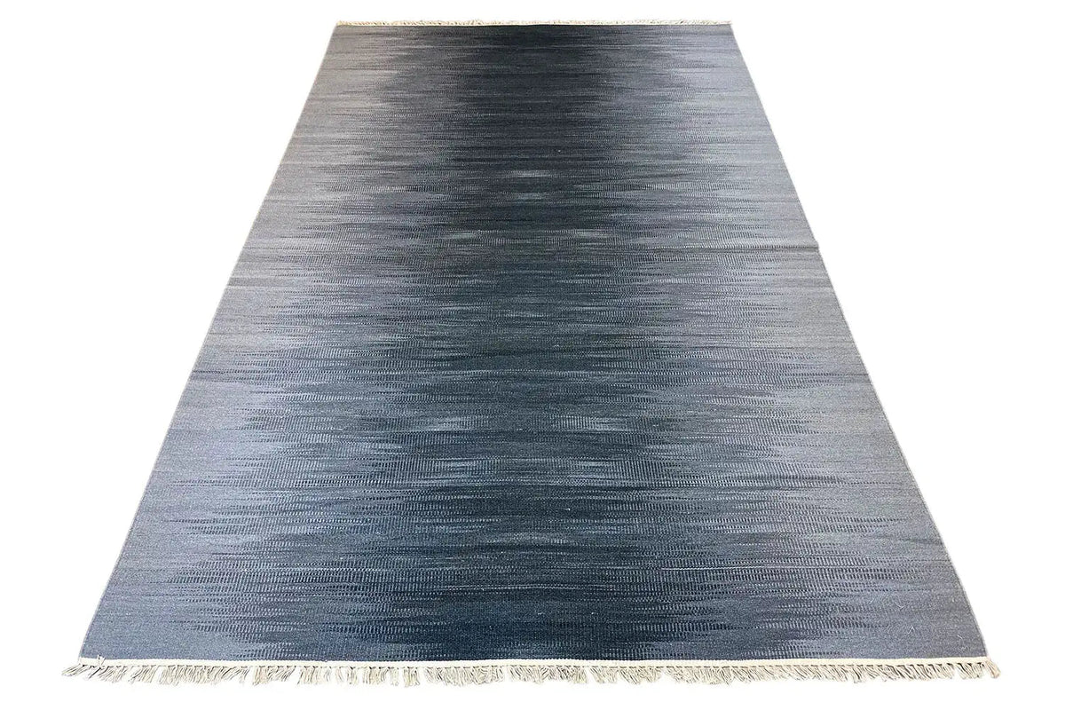 Gray ombré kilim dhurrie rug with fringes, trapezoidal