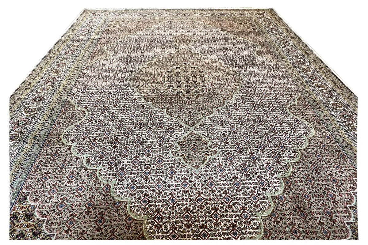Indo Tabriz rug with a large medallion, all-over ornamentation