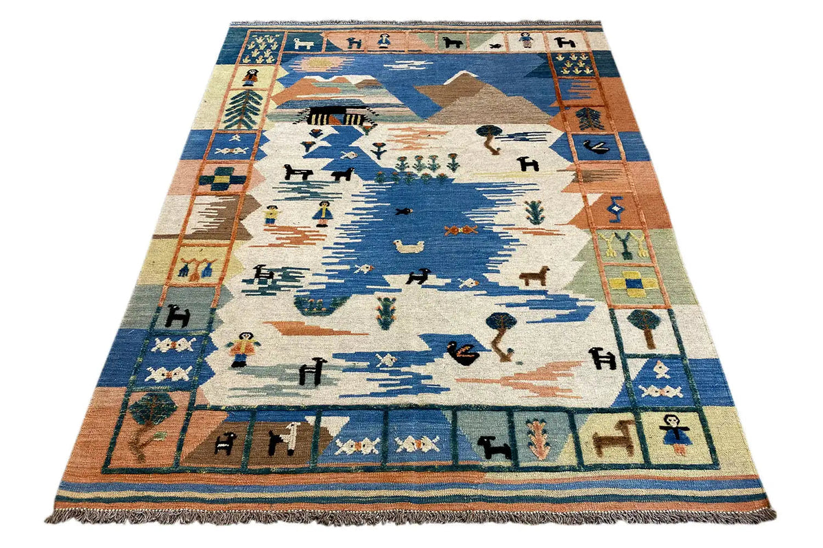 Kilim rug with an all-around border pattern and a central motif in blue, beige, and rust orange