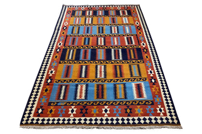 Colorful kilim rug with a wide central band and geometric stripes in orange and blue