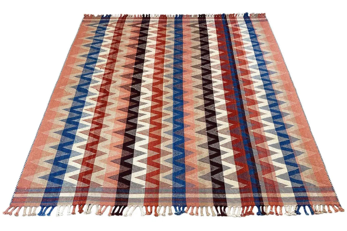 Large rug with zigzag stripes in terracotta, blue and black, fringes
