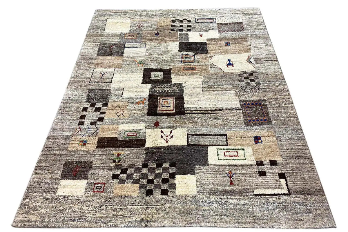 Gabbeh rug: Overall view with an all-over pattern of quadrilaterals, lines, and small accents.