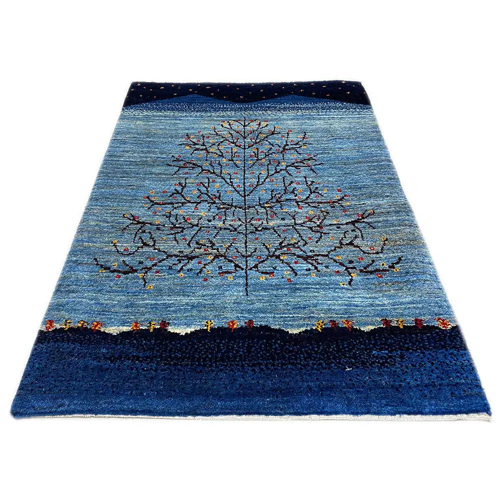 Gabbeh rug, mottled blue with gray tree vines and colorful dots, rectangular