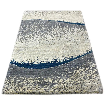 Gabbeh rug with abstract pattern: light beige, anthracite gray and dark blue, curved line