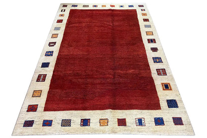 Gabbeh rug 297x202 cm, framed red area with a geometric border pattern