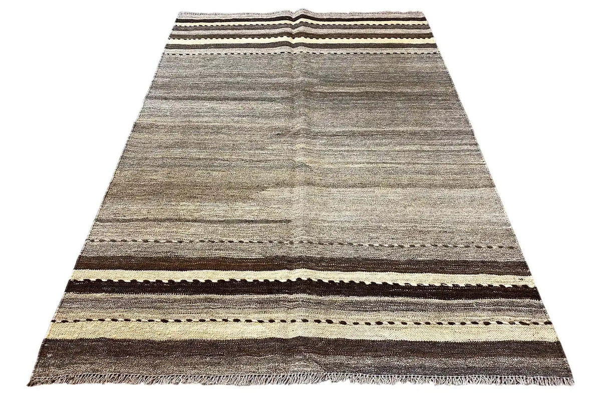 Kilim rug in portrait orientation: gray striped pattern with brown, beige, and black borders