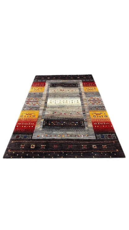 Rug with a light central stripe and dark border, patterned edging