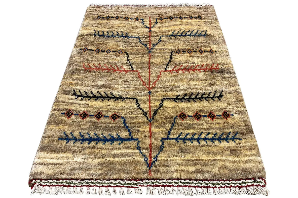 Gabbeh Lori rug (79x62 cm) with a central cross pattern and decorative fringe along the edge