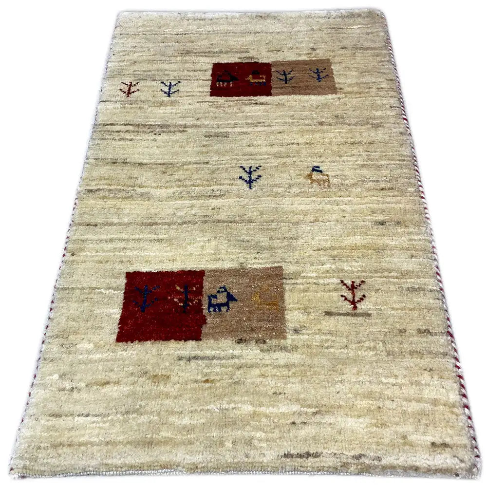 Gabbeh rug 63x36 cm with beige pile and red and blue fields and motifs
