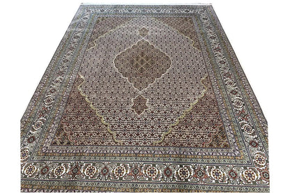 Indo Tabriz rug, rectangular; geometric pattern in brown and blue with border