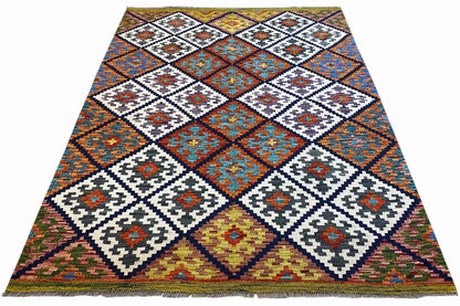 Kilim rug with a square and diamond pattern in blue, white, and yellow