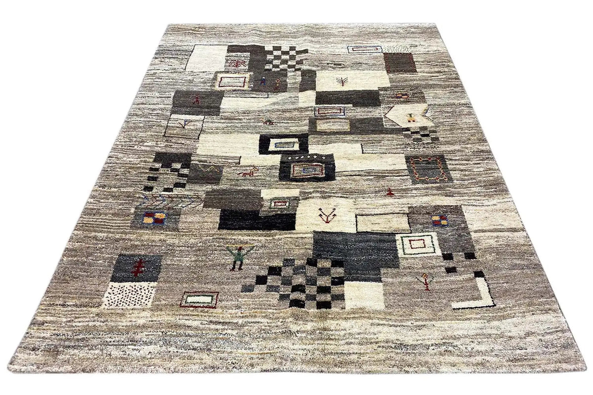Wide-format Gabbeh rug with abstract patchwork squares