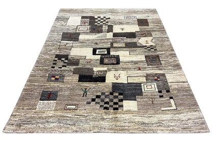 Wide-format Gabbeh rug with abstract patchwork squares