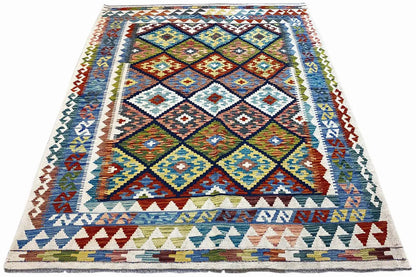 Afghan kilim, rectangular, with a diamond and zigzag border in blue, yellow, and brown