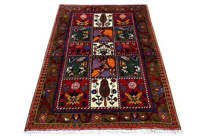 Bakhtiari rug, spread out rectangularly; central pattern and border edging